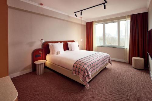 Кровать или кровати в номере Van der Valk Hotel Park Lane Antwerpen