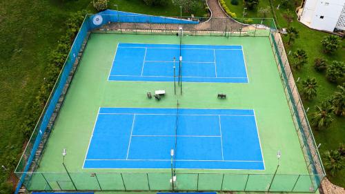 an overhead view of a tennis court at Lancaster Kumasi City in Kumasi