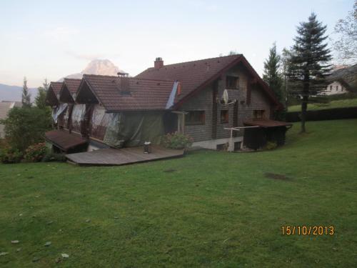 a house with a large yard in front of it at Salzkammergut, a place to enjoy in Traunkirchen