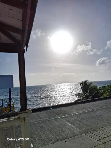 a view of the ocean from a beach at Apartamentos Bahia Rocky Point in Providencia
