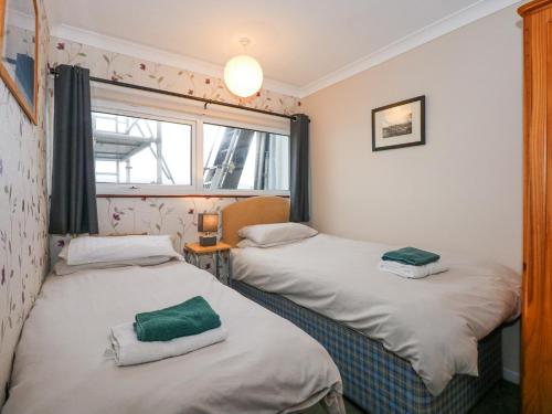 Postel nebo postele na pokoji v ubytování 18D South Snowdon Wharf