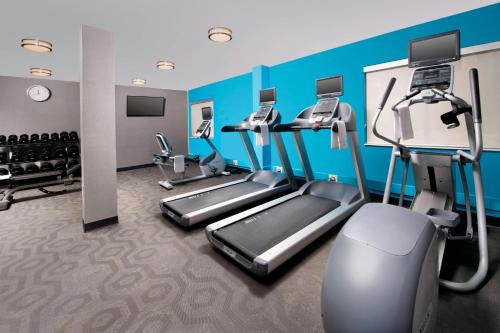 a fitness room with treadmills and cardio machines at Fairfield Inn & Suites by Marriott Albany East Greenbush in East Greenbush