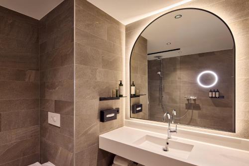 Ванная комната в Van der Valk Hotel Park Lane Antwerpen