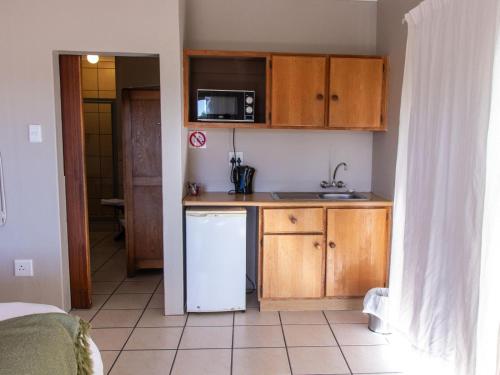 Una cocina o zona de cocina en Riverview Guesthouse