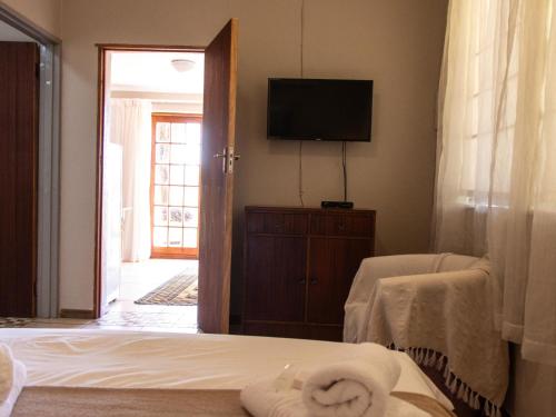 Cama o camas de una habitación en Riverview Guesthouse