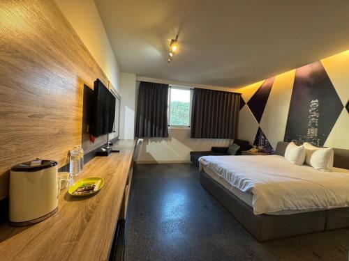 Postel nebo postele na pokoji v ubytování Travel Light Hotel