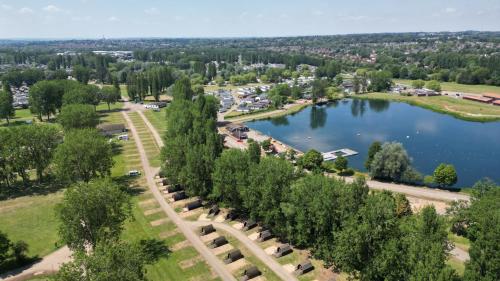 an aerial view of a park with a lake at Billing Aquadrome Holiday Park in Great Billing