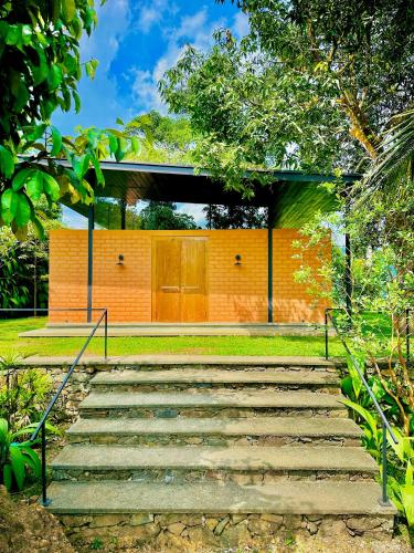 Taman di luar Singhe Villa Banagala