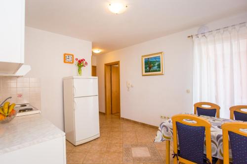 Kuchyň nebo kuchyňský kout v ubytování Apartments Lorena B
