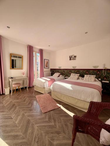 Кровать или кровати в номере Le Grand Hotel