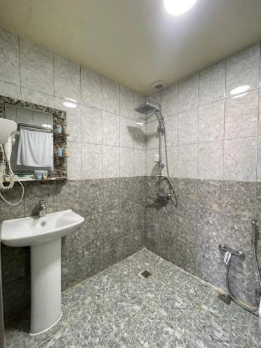 Ένα μπάνιο στο Zamco Boutique Hotel