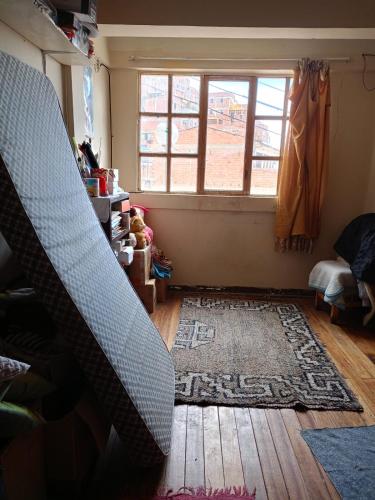 Zona d'estar a Acogedora casa céntrica