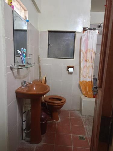 Bany a Acogedora casa céntrica