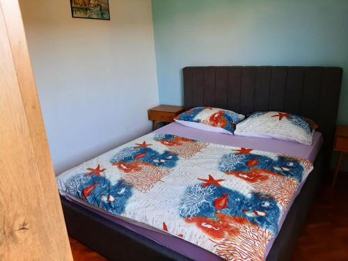 Ένα ή περισσότερα κρεβάτια σε δωμάτιο στο Apartment Denis