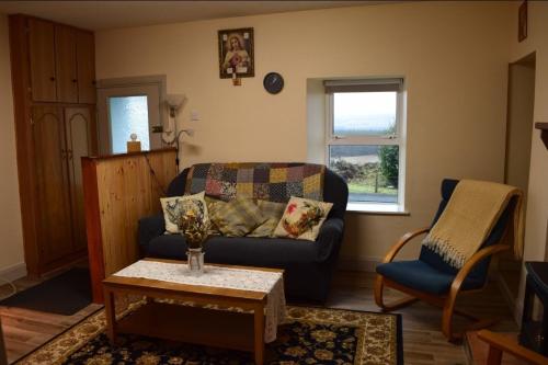Area soggiorno di Heather Cottage Doolin