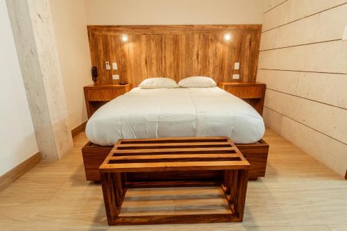 Postel nebo postele na pokoji v ubytování Xoza Hotel Urban Escape