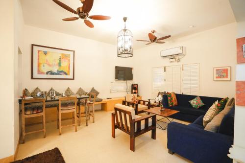 Гостиная зона в VILLA M - SOLITUDE 1 CANDOLIM GOA 3BHK, Pool Facing, Near Beach, Free Breakfast, Free WIFI and Prime Location
