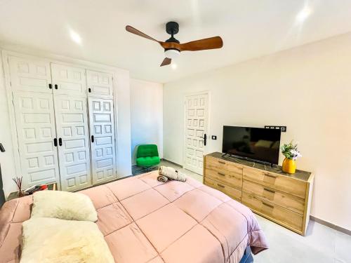 En eller flere senge i et værelse på Rentaliday Sweet Colon