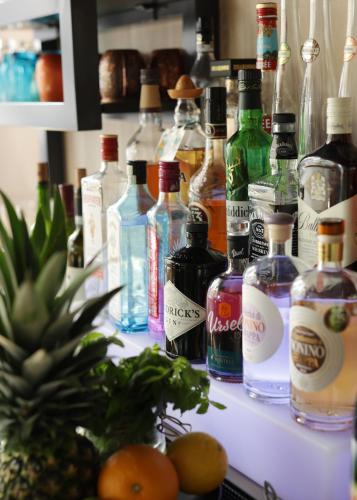 a bunch of bottles of alcohol sitting on a shelf at ibis Frankfurt Centrum in Frankfurt/Main