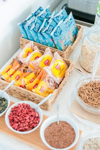 a counter with baskets of chips and other food at Hotel Centrale Miramare in Rimini