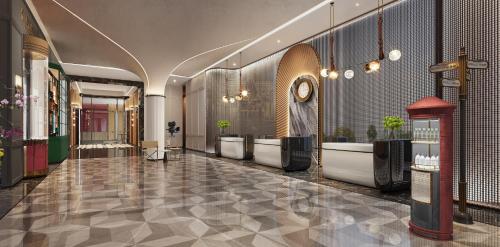 a bathroom with a row of sinks and toilets at Hotel Indigo Harbin Central Avenue by IHG in Harbin