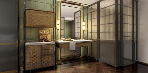 a bathroom with two sinks and a mirror at Hotel Indigo Harbin Central Avenue by IHG in Harbin