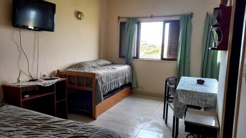 Ένα ή περισσότερα κρεβάτια σε δωμάτιο στο Altamar