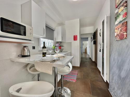 Kuchyň nebo kuchyňský kout v ubytování Charming Apartments Dodo