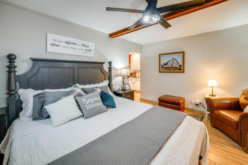 a bedroom with a bed and a ceiling fan at RockinB88 Ranch Retreat Terrell Home Near Shops in Terrell