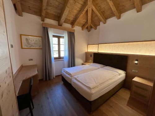 Postel nebo postele na pokoji v ubytování Casa Miramonti