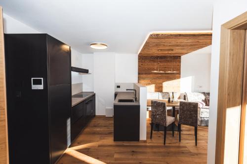 Kuchyň nebo kuchyňský kout v ubytování Paradeis Apartments