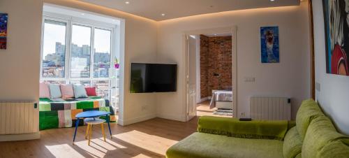 TV a/nebo společenská místnost v ubytování Cómodo y Moderno piso en el centro de Santander