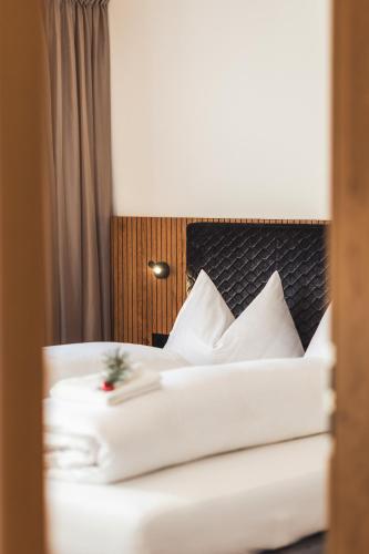 Postel nebo postele na pokoji v ubytování Paradeis Apartments