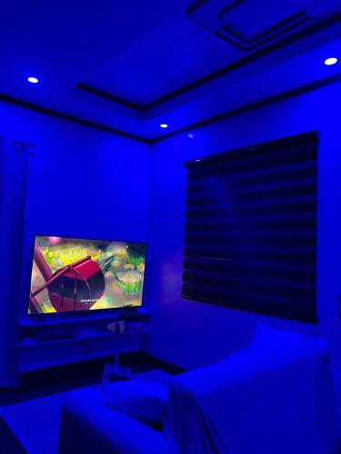 H&K Guest Houseにあるテレビまたはエンターテインメントセンター
