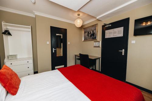 Ένα ή περισσότερα κρεβάτια σε δωμάτιο στο Hotel Renesse