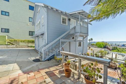 a house with a staircase in front of it at Bankers Hill Hideaway with AC Views and Parking in San Diego