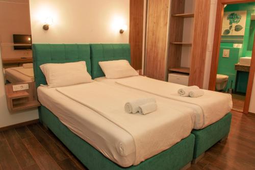 Ένα ή περισσότερα κρεβάτια σε δωμάτιο στο Boulevard Luxury Apartments City Center Ohrid
