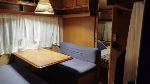 Postel nebo postele na pokoji v ubytování Caravana en La Sierra