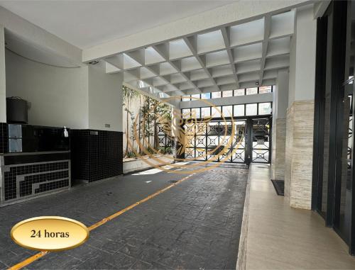a large building with a horoscopes at Coruja Imob - Flat Crystal Place in Goiânia