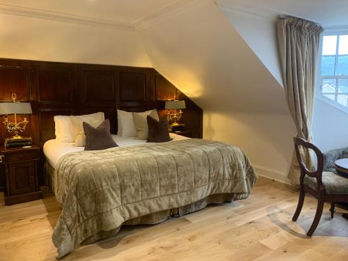 a bedroom with a large bed in a room at 23 Mayfield in Edinburgh