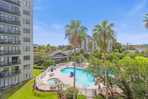 an aerial view of a swimming pool in a apartment building at 18-Universal and Heart of International Dr in Orlando