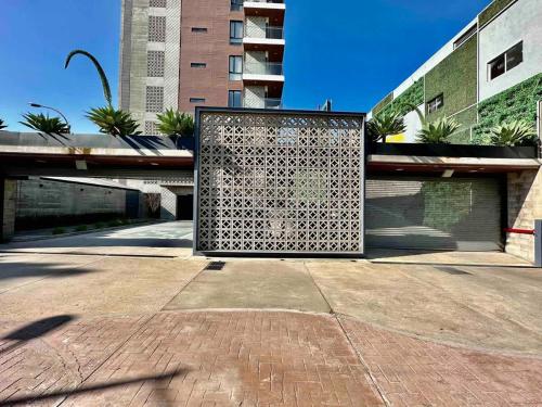 a metal gate in the middle of a street at Tijuana Condo at Avenida Revolución 9th floor in Tijuana