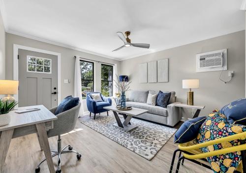 a living room with a couch and a table at 15% off! Front porch w/ Wi-Fi & Private Parking in Gibsonville