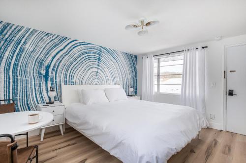 Ένα ή περισσότερα κρεβάτια σε δωμάτιο στο The Windmoor Lodge