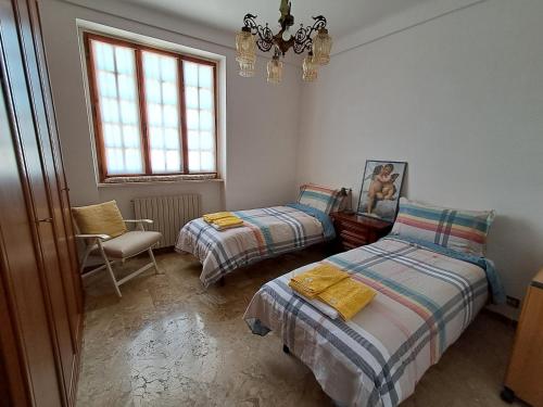 A bed or beds in a room at Trullo Pentimelle e Casa Pentimelle