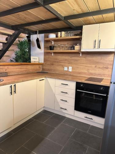 Kuchyň nebo kuchyňský kout v ubytování Apartment Zumbul