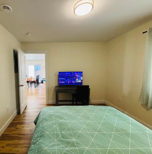 TV a/nebo společenská místnost v ubytování New Guesthouse