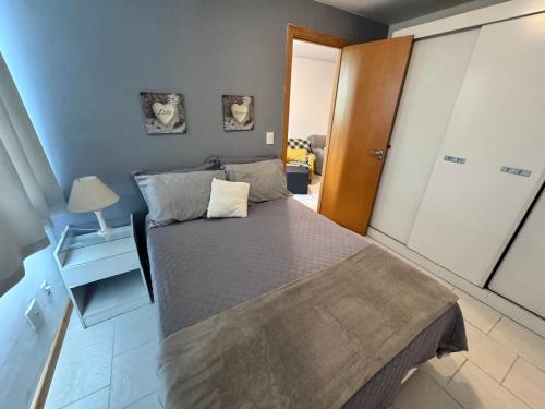 a bedroom with a large bed in a room at Lapa reformado melhor localização in Rio de Janeiro