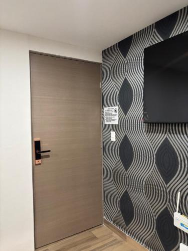 TV a/nebo společenská místnost v ubytování Habitación privada en departamento compartido centro de la cuidad de México CDMX Buenavista, cerca de reforma revolución zocalo