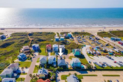 an aerial view of a beach with a parking lot at Casa Playa - Ocean Views Pet Friendly Boardwalk in Port Aransas